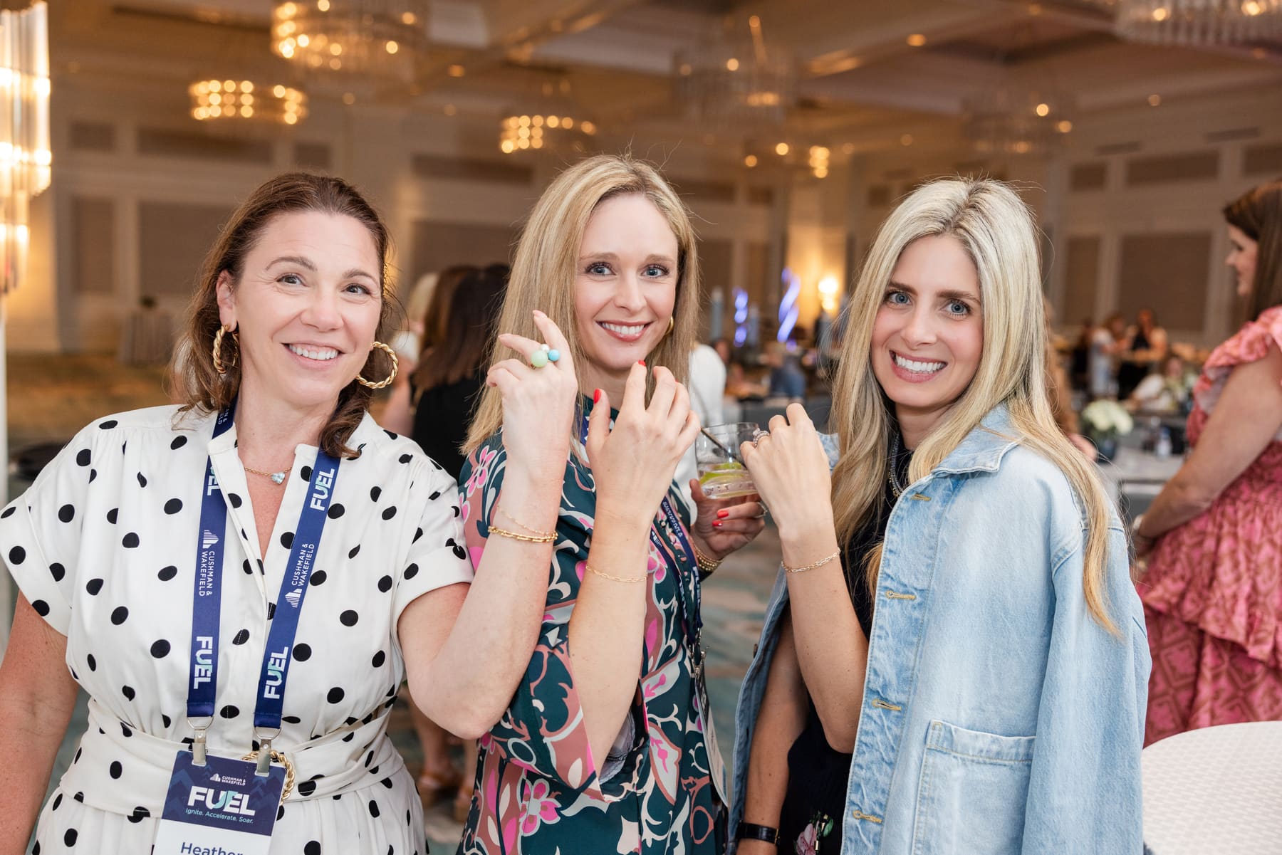 Guests connecting over permanent jewelry at a Spark Collective team gathering